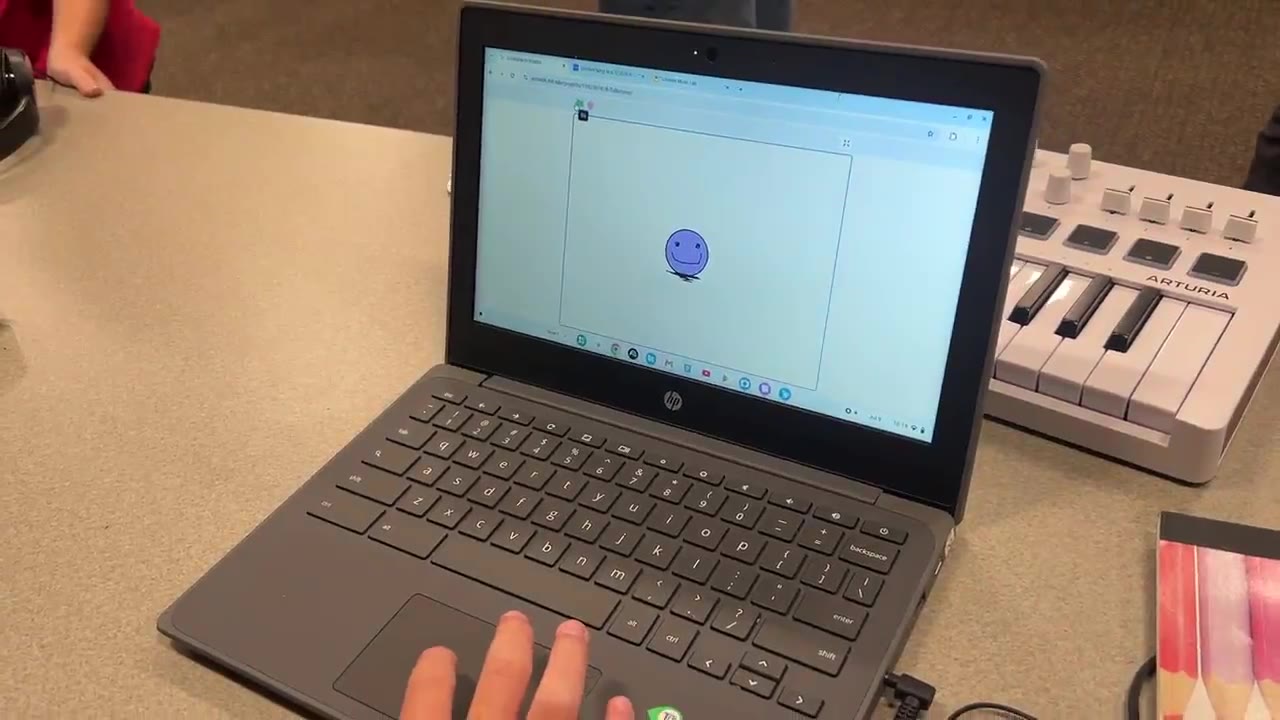 Scratch project running on a Chromebook beside a MIDI keyboard